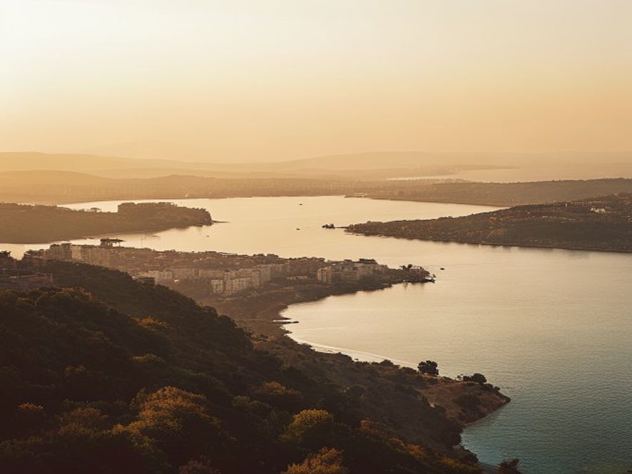 Aerial view of Auckland from a hillside overlooking the city and harbours
